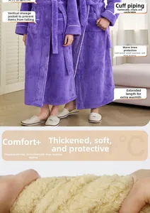 Detail view of purple coral fleece robe with pocket and warm plush lining texture