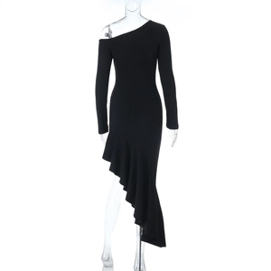 Detail of elegant black one-shoulder dress showing ruffles and dense elastic fabric texture