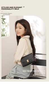 Detail of black leather chain bag featuring gold rivets and elegant twist lock closure