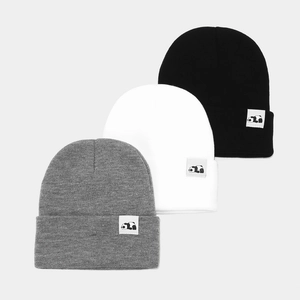 Three-pack knitted beanies in black white and grey with panda label detail