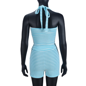 Detail of blue and white striped knit halter top with backless tie design and shorts