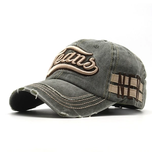 Close-up of distressed brim and 3D Jeans embroidery on washed cotton baseball cap