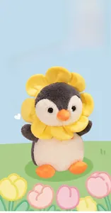 Close-up of plush penguin toy with yellow sunflower petal collar and soft fabric texture