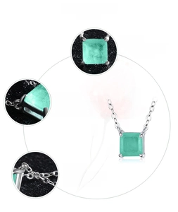 Detailed view of S925 sterling silver necklace with emerald-cut green cubic zirconia