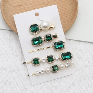 5-piece vintage emerald rhinestone hair clip set with pearls on white card