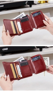 Vista dettagliata del portafoglio rosso in pelle cerata con fessure per carte e RFID-Schutz