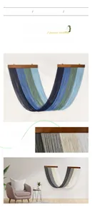 Close-up of hand-woven cotton macrame wall hanging with gradient fringe and wood pole