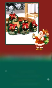 Close-up of mini Christmas star wreath with red bow, golden bell and Merry Christmas sign