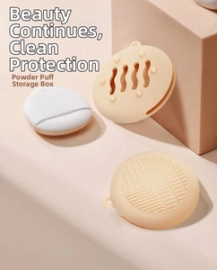 Detailed view of pink silicone makeup sponge cases with wave vents and round powder puff
