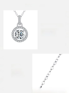 Detailed macro view of D color VVS1 moissanite pendant set in 925 sterling silver