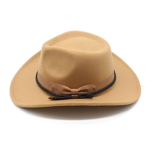 Detailed close-up of double decorative bands and metal fastener on a camel wool cowboy hat
