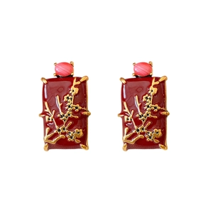 Vintage red enamel square earrings with golden floral relief and pink gemstone detail