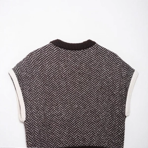 Brown and white herringbone knit vest top with ribbed crewneck in a flat lay view
