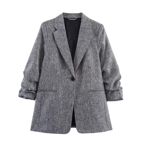 Women's grey tweed blazer with pleated sleeves and single button closure for casual office wear