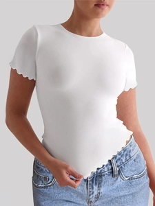Detailed view of women's white slim yoga t-shirt featuring ruffled hem and lettuce edges