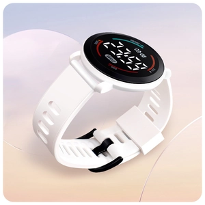 Detail of white silicone strap and digital LED screen showing date and steps