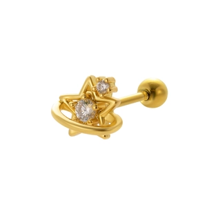Macro shot of gold star-shaped stud earring with halo and sparkling zircon stones