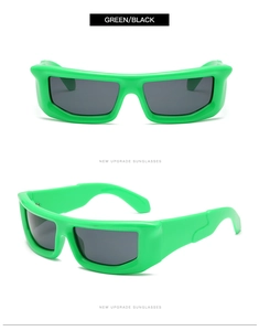 Detail view of fluorescent green Y2K rectangular sunglasses with dark lenses