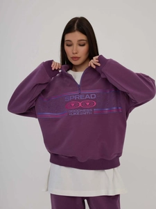 Women's purple half-zip sweatshirt with Spread Goodness print and casual trousers