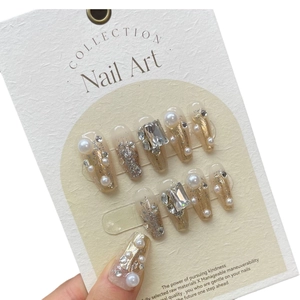 Long trapezoid champagne gold glitter gradient press-on nails with pearls and rhinestones
