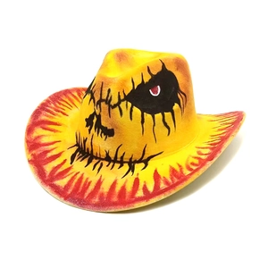 Yellow cowboy hat with orange flame patterns and graffiti eye design for parties