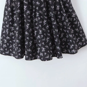 French vintage floral puff dress in black and lilac with draped skirt details
