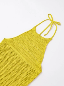 Detailed view of the crochet knit texture and halter drawstring tie in bright yellow