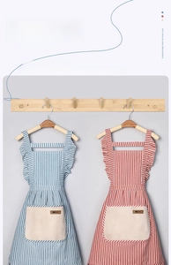 Detail of striped aprons with absorbent coral fleece hand towels on large pockets
