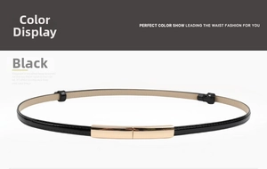 Detail view of glossy black patent leather belt with rectangular gold metal buckle
