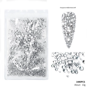 Detailed view of 1440pcs Transparent AB flat bottom nail art rhinestones with macro shots