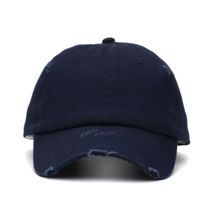 Distressed navy blue cotton ponytail baseball cap with vintage washed details and frayed brim
