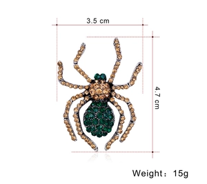 Detail view of rhinestone spider brooch with dimensions 3.5cm by 4.7cm and 15g weight