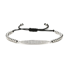 Bracelet ajustable en cordon noir avec breloque en zircon et perles métalliques polies