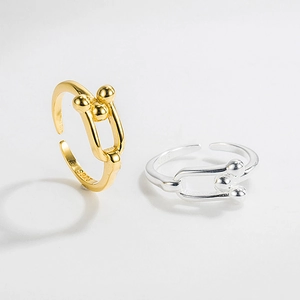 925 Sterling silver horseshoe open ring in gold and silver finish on white background