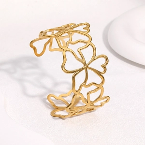 Bracelet jonc ouvert en acier inoxydable plaqué or 18 carats avec motif fleur ajouré