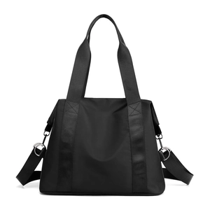 Versatile black nylon crossbody handbag with adjustable shoulder straps for women