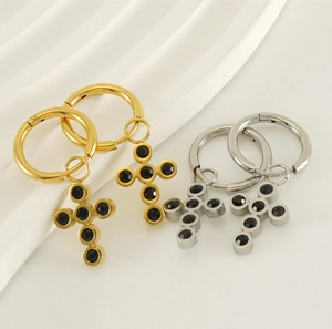 Polished 18k gold and silver stainless steel hoop earrings with black cross charms