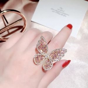 Luxurious open butterfly ring in rose gold with pink crystals and zircon stones