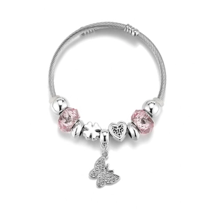 Detail view of silver stainless steel charm bracelet with pink faceted beads and clovers