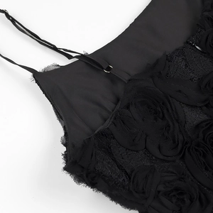 Detailed view of black floral lace bodice with 3D flowers and adjustable straps