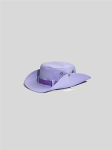 Detail view of purple outdoor sun hat featuring metal ventilation eyelets and chin strap
