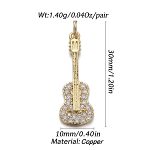 Detailed size specifications for a gold guitar pendant made of copper material