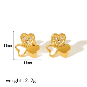 Detail view of heart-clover gold earrings with clear crystals showing 11mm size and 2.2g weight