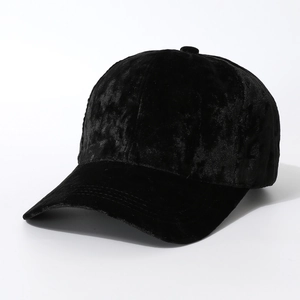 Close-up detail of high-quality black velvet texture on the stylish baseball cap