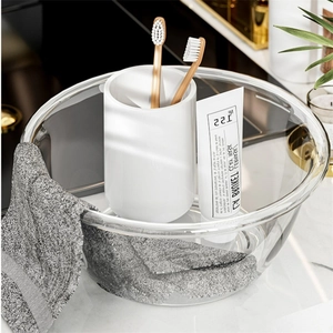 Thick transparent washbasin in light luxury style on white marble bathroom vanity
