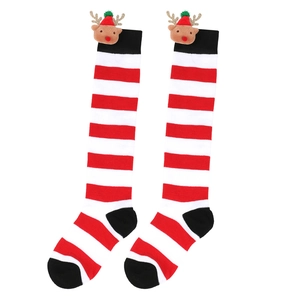 Kids Christmas socks with festive red white stripes and plush reindeer dolls