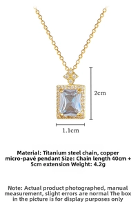 Detail view of square zircon pendant with sparkling pavé crystals on gold titanium chain