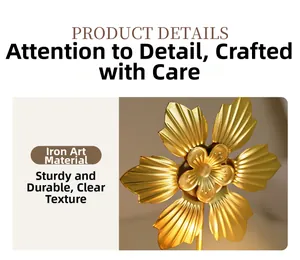Detail of golden iron floral candle holder showing radial petal textures and metal craftsmanship