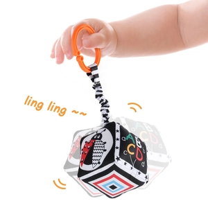 Black and white high contrast infant soft cube toy with hanging ring for sensory play
