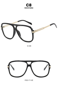 Detail view of square pilot sunglasses with black frame, gold metal arms and double bridge